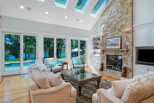 Fireplace, Interior, Living room, Recessed Lighting, Stone Walls, Wood Texture Flooring
