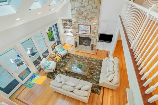 Fireplace, Interior, Living room, Recessed Lighting, Stone Walls, Wood Texture Flooring