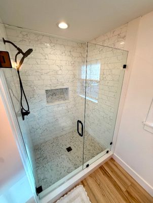 Bathroom, Glass Shower, Interior, Marble Walls, Recessed Lighting, Wood Texture Flooring