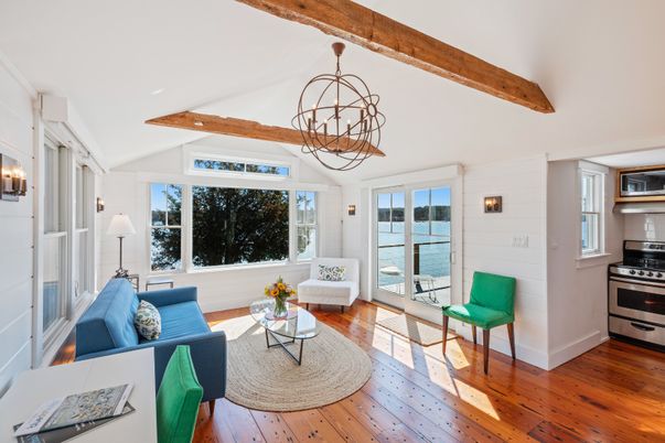 Chandelier, Interior, Kitchen, Living room, Pendant Lights, Stainless Steel Appliances, Water, Wooden Beams, Wood Texture Flooring