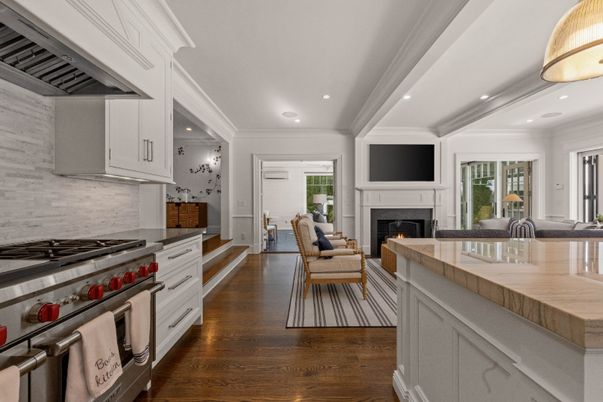 Dining room, Fireplace, Interior, Kitchen, Living room, Recessed Lighting, Stainless Steel Appliances, Wood Texture Flooring