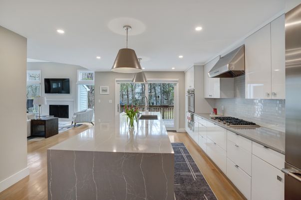 Fireplace, Interior, Kitchen, Living room, Pendant Lights, Recessed Lighting, Stainless Steel Appliances, Wood Texture Flooring