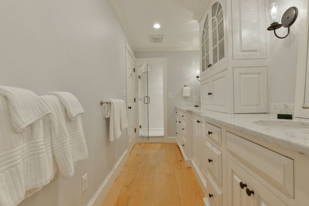 Bathroom, Dual Sink Vanities, Interior, Recessed Lighting, Wood Texture Flooring