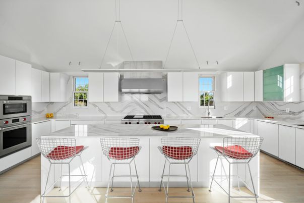 Interior, Kitchen, Marble Walls, Pendant Lights, Recessed Lighting, Stainless Steel Appliances, Wood Texture Flooring