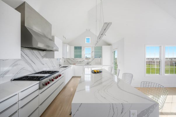 Interior, Kitchen, Marble Walls, Pendant Lights, Stainless Steel Appliances, Wood Texture Flooring