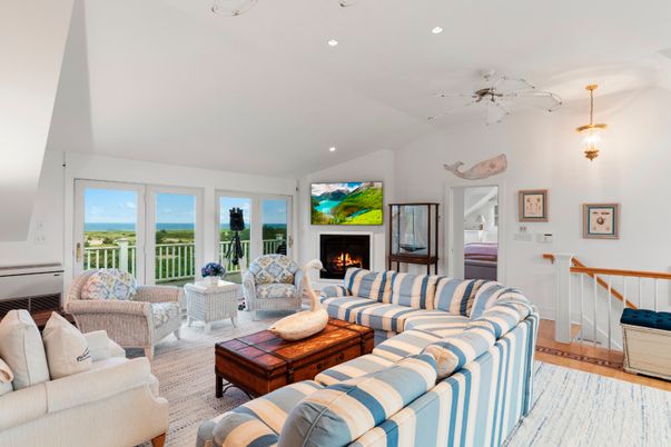 Fireplace, Interior, Living room, Pendant Lights, Recessed Lighting, Water, Wood Texture Flooring