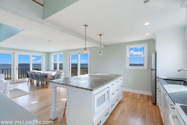 Dining room, Interior, Kitchen, Pendant Lights, Recessed Lighting, Water, Wood Texture Flooring