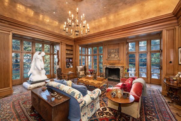 Chandelier, Fireplace, Interior, Living room, Recessed Lighting, Wood Texture Flooring, Wooden Walls