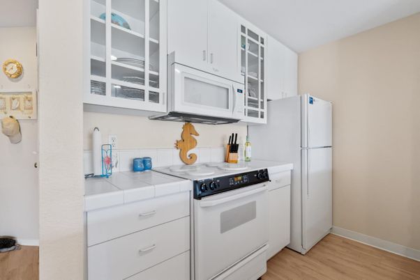 Interior, Kitchen, Tile Countertops, Wood Texture Flooring