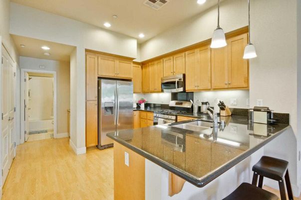 Interior, Kitchen, Pendant Lights, Recessed Lighting, Stainless Steel Appliances, Wood Texture Flooring