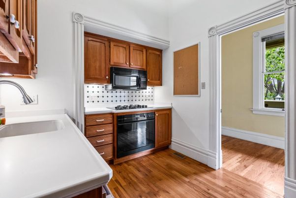 Interior, Kitchen, Tile Countertops, Wood Texture Flooring