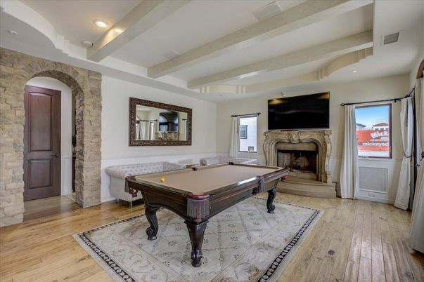 Billiard Table, Fireplace, Game Room, Interior, Recessed Lighting, Stone Walls, Wood Texture Flooring