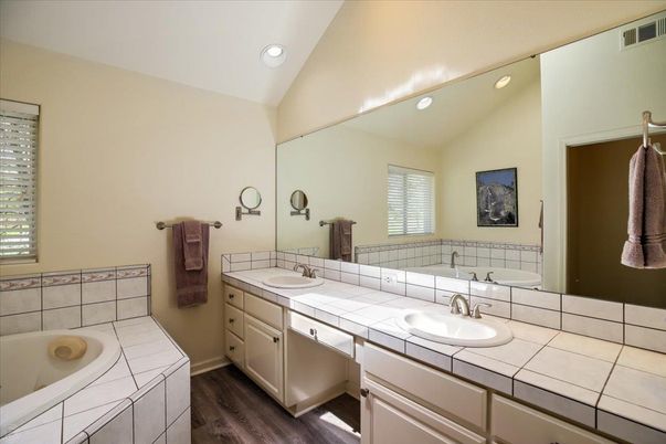 Bathroom, Dual Sink Vanities, Interior, Recessed Lighting, Tile Countertops, Wood Texture Flooring