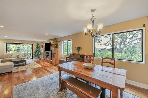 Chandelier, Dining room, Fireplace, Interior, Living room, Recessed Lighting, Wood Texture Flooring