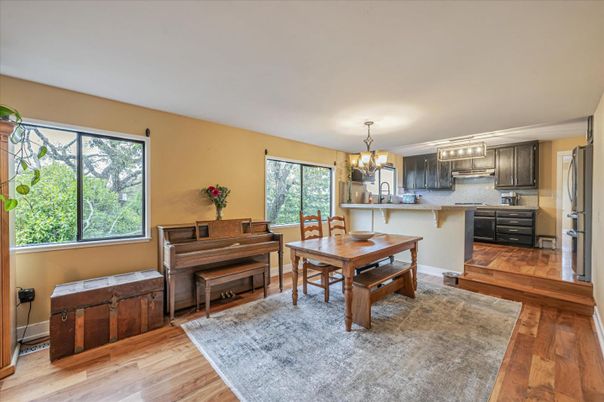 Chandelier, Dining room, Interior, Piano, Wood Texture Flooring