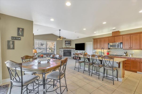 Dining room, Fireplace, Interior, Kitchen, Recessed Lighting, Stainless Steel Appliances