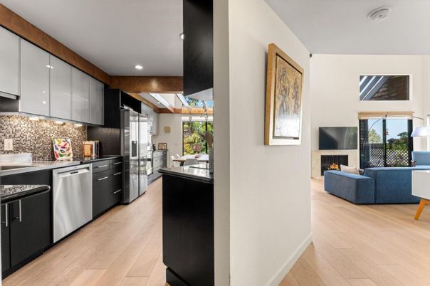 Fireplace, Interior, Kitchen, Living room, Pendant Lights, Recessed Lighting, Stainless Steel Appliances, Wood Texture Flooring