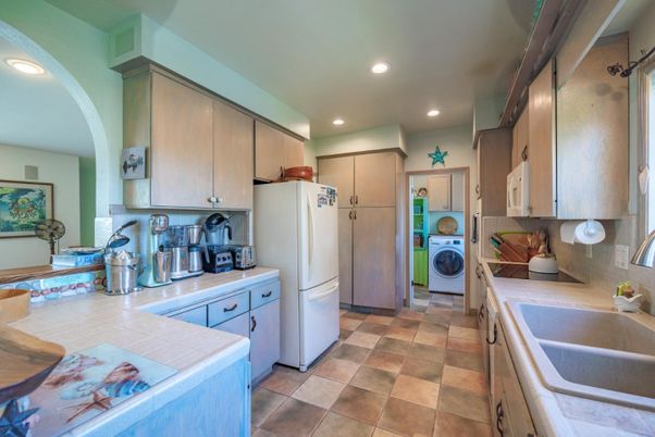 Interior, Kitchen, Recessed Lighting, Tile Countertops, Washer