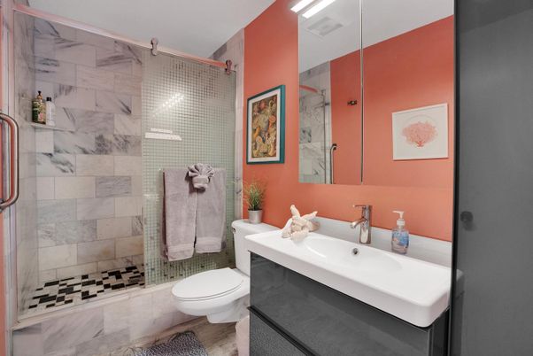 Bathroom, Glass Shower, Interior, Marble Walls, Wood Texture Flooring