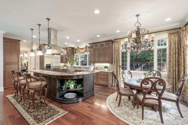 Chandelier, Dining room, Interior, Kitchen, Pendant Lights, Recessed Lighting, Stainless Steel Appliances, Wood Texture Flooring