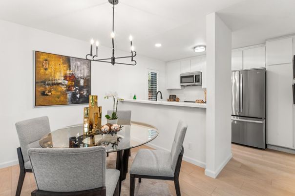 Dining room, Interior, Kitchen, Pendant Lights, Recessed Lighting, Stainless Steel Appliances, Wood Texture Flooring