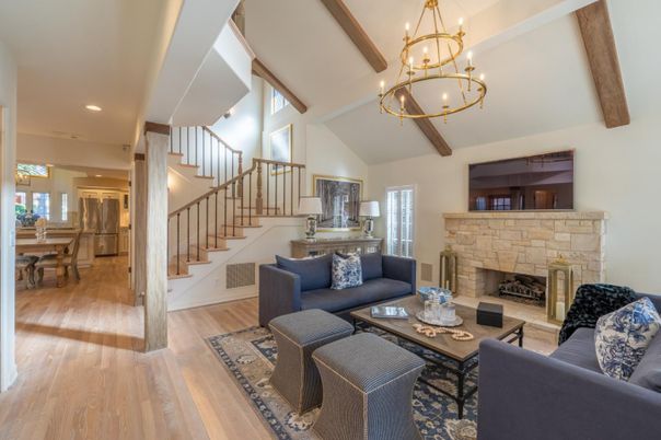 Chandelier, Dining room, Fireplace, Interior, Living room, Recessed Lighting, Wooden Beams, Wood Texture Flooring