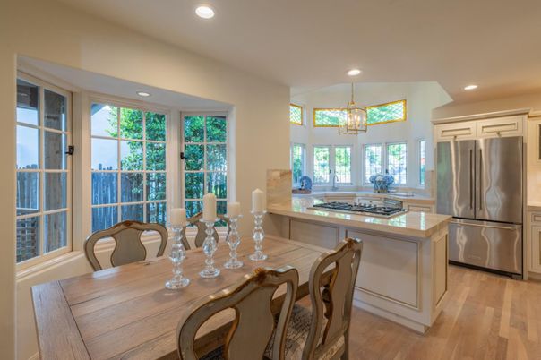 Chandelier, Dining room, Interior, Kitchen, Recessed Lighting, Stainless Steel Appliances, Wood Texture Flooring