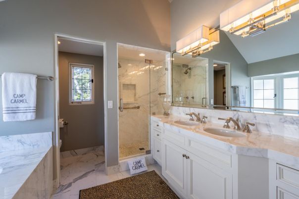 Bathroom, Dual Sink Vanities, Glass Shower, Interior, Marble, Marble Walls, Recessed Lighting