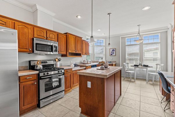 Dining room, Interior, Kitchen, Pendant Lights, Recessed Lighting, Stainless Steel Appliances, Tile Countertops