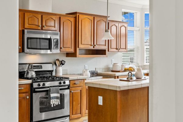 Interior, Kitchen, Pendant Lights, Stainless Steel Appliances, Tile Countertops