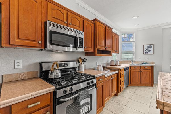 Interior, Kitchen, Recessed Lighting, Stainless Steel Appliances, Tile Countertops