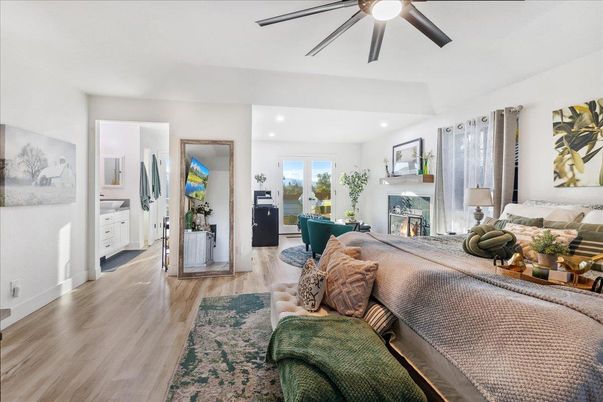 Bedroom, Fireplace, Interior, Recessed Lighting, Wood Texture Flooring