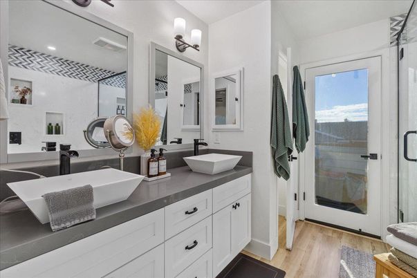 Bathroom, Dual Sink Vanities, Glass Shower, Interior, Recessed Lighting, Wood Texture Flooring
