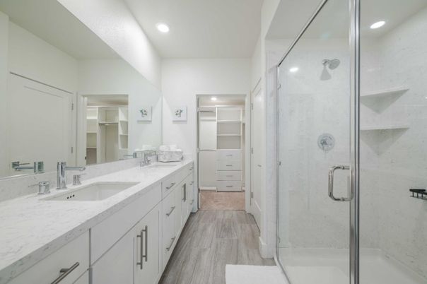 Bathroom, Dual Sink Vanities, Glass Shower, Interior, Recessed Lighting, Walk-in Closets, Wood Texture Flooring