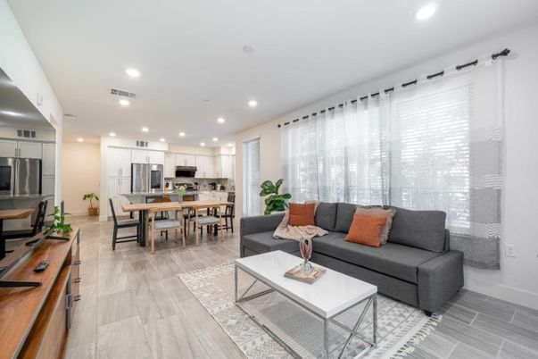 Dining room, Interior, Kitchen, Living room, Recessed Lighting, Stainless Steel Appliances, Wood Texture Flooring