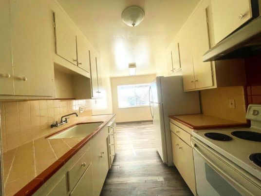 Interior, Kitchen, Tile Countertops, Wood Texture Flooring