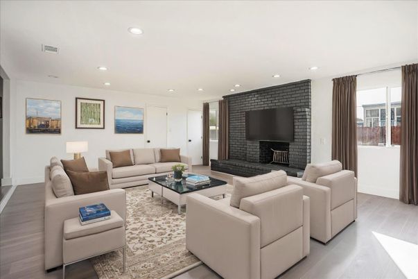 Fireplace, Interior, Living room, Recessed Lighting, Stone Walls, Wood Texture Flooring