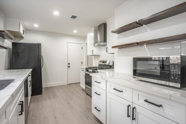 Interior, Kitchen, Recessed Lighting, Stainless Steel Appliances, Wood Texture Flooring