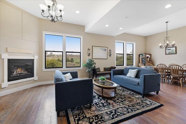 Chandelier, Dining room, Fireplace, Interior, Living room, Recessed Lighting, Wood Texture Flooring