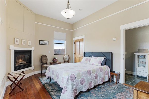 Bedroom, Fireplace, Interior, Pendant Lights, Wood Texture Flooring