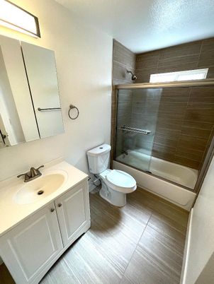 Bathroom, Dual Sink Vanities, Glass Shower, Interior, Wood Texture Flooring
