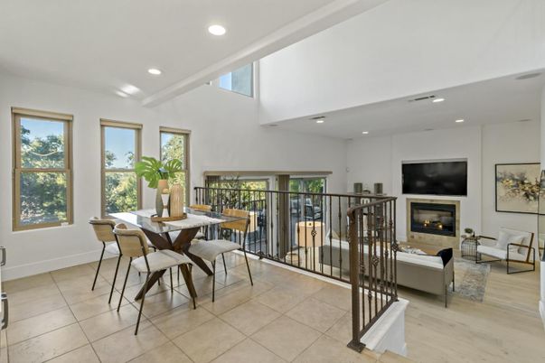 Dining room, Fireplace, Interior, Living room, Recessed Lighting, Wood Texture Flooring