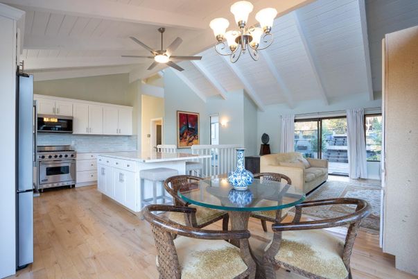 Chandelier, Dining room, Interior, Kitchen, Living room, Stainless Steel Appliances, Wood Texture Flooring