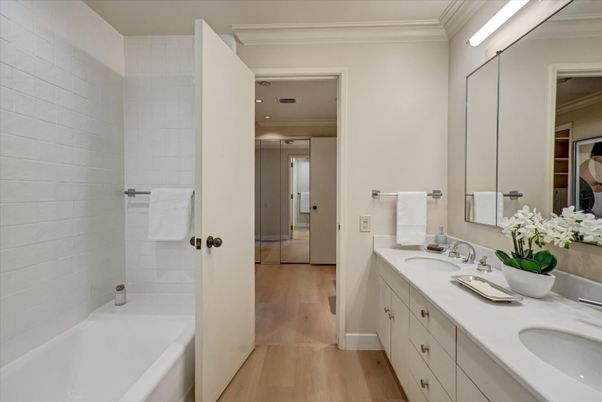 Bathroom, Dual Sink Vanities, Glass Shower, Interior, Recessed Lighting, Wood Texture Flooring