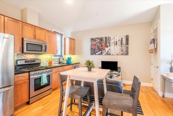 Dining room, Interior, Kitchen, Recessed Lighting, Stainless Steel Appliances, Wood Texture Flooring