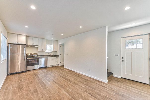 Interior, Kitchen, Recessed Lighting, Stainless Steel Appliances, Wood Texture Flooring