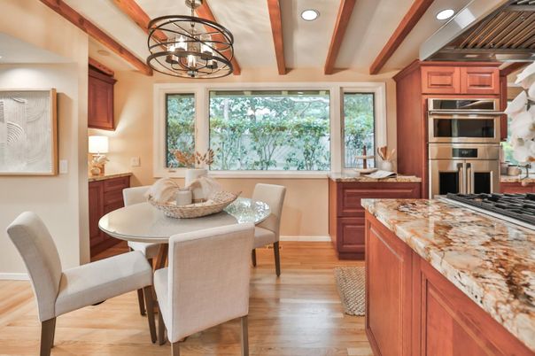 Chandelier, Dining room, Interior, Kitchen, Recessed Lighting, Stainless Steel Appliances, Wooden Beams, Wood Texture Flooring
