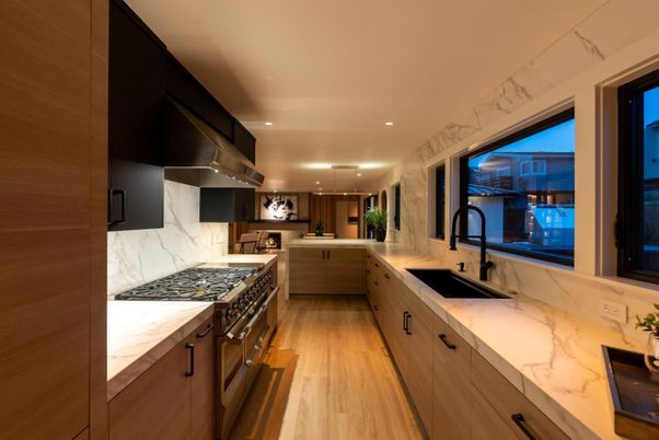 Interior, Kitchen, Marble Walls, Recessed Lighting, Stainless Steel Appliances, Wood Texture Flooring