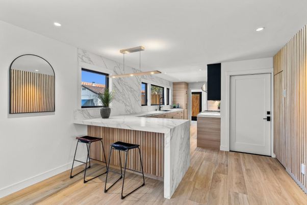 Interior, Kitchen, Marble Walls, Pendant Lights, Recessed Lighting, Wood Texture Flooring
