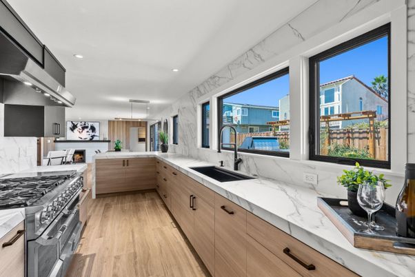 Interior, Kitchen, Marble Walls, Pendant Lights, Recessed Lighting, Stainless Steel Appliances, Wood Texture Flooring